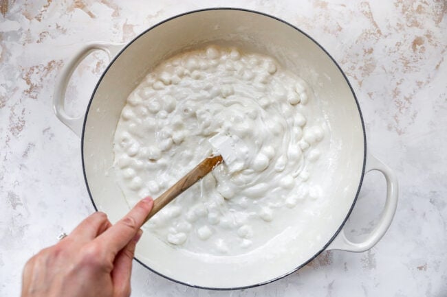 melting marshmallows in pan for rice krispie treats.