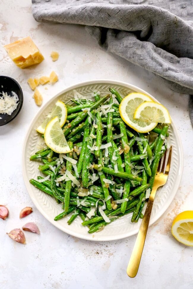 roasted green beans on plate  