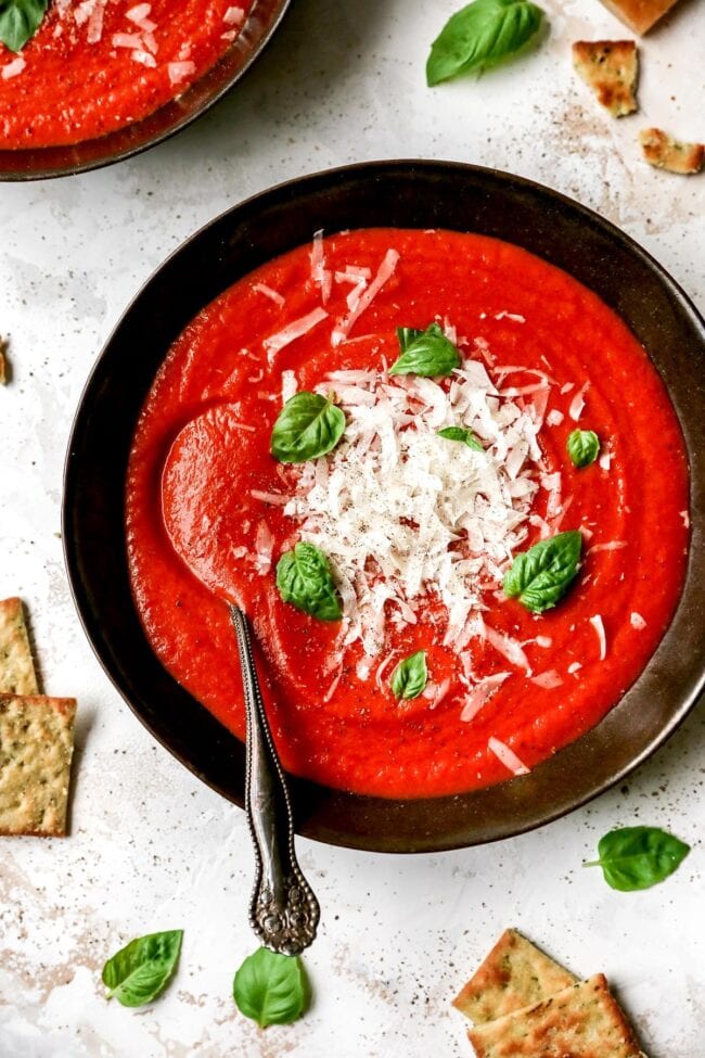 roasted tomato basil soup in bowl with spoon