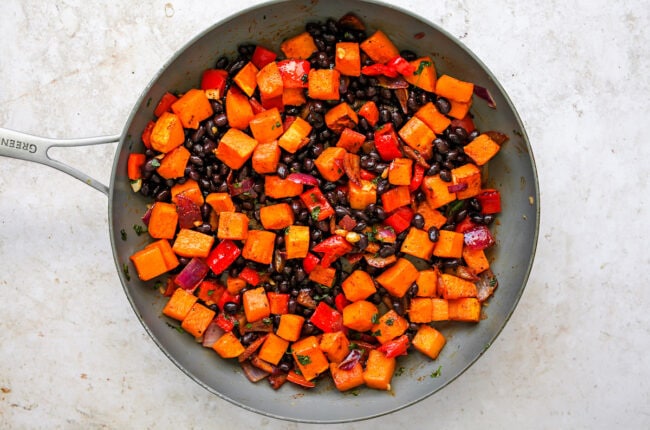 Butternut squash enchilada filling in pan