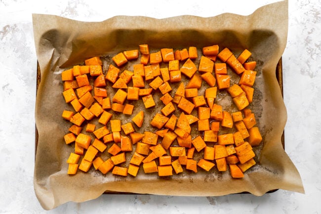 Roasted butternut squash on pan for Brown Butter Ravioli with Butternut Squash Recipe