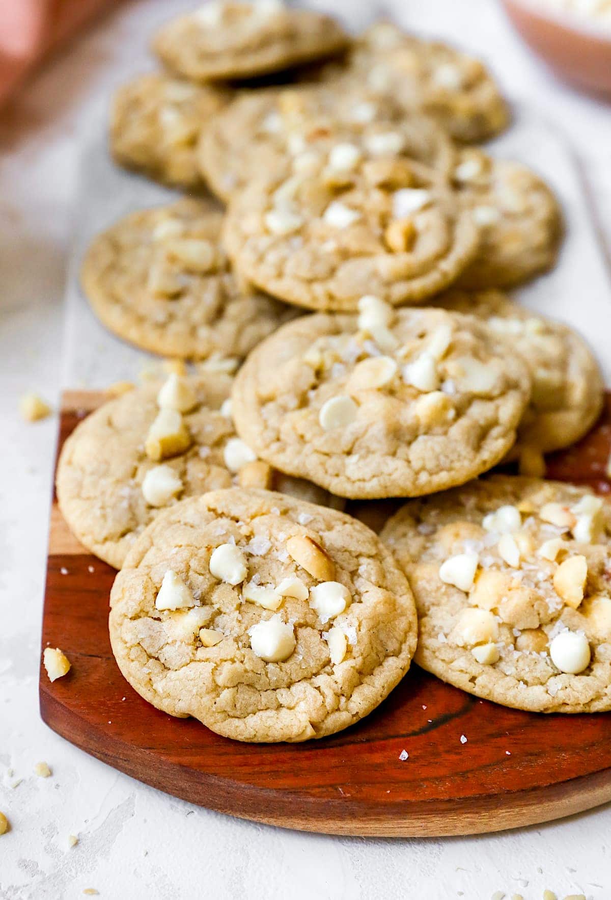 best white chocolate macadamia nut cookies on platter. 
