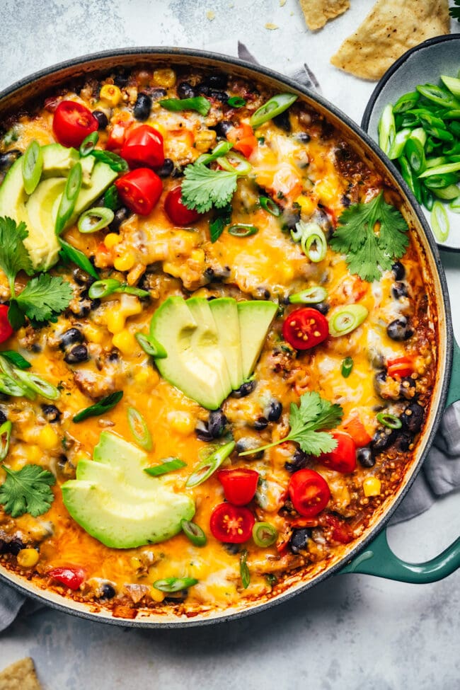 vegetarian taco skillet in pan with cheese and toppings
