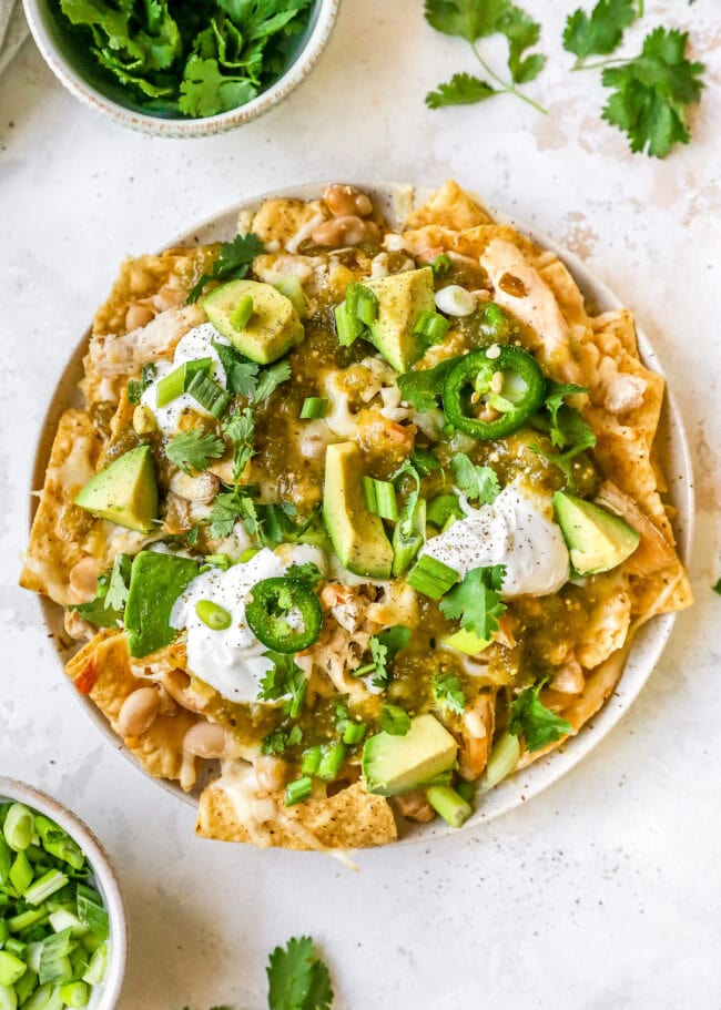 white chicken chili nachos on plate