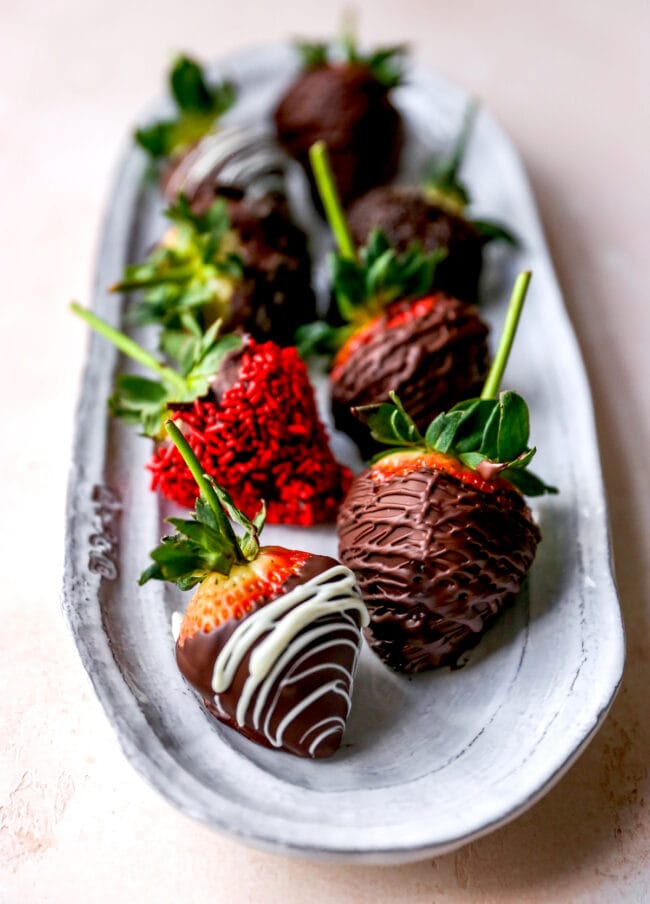 chocolate covered strawberries on platter
