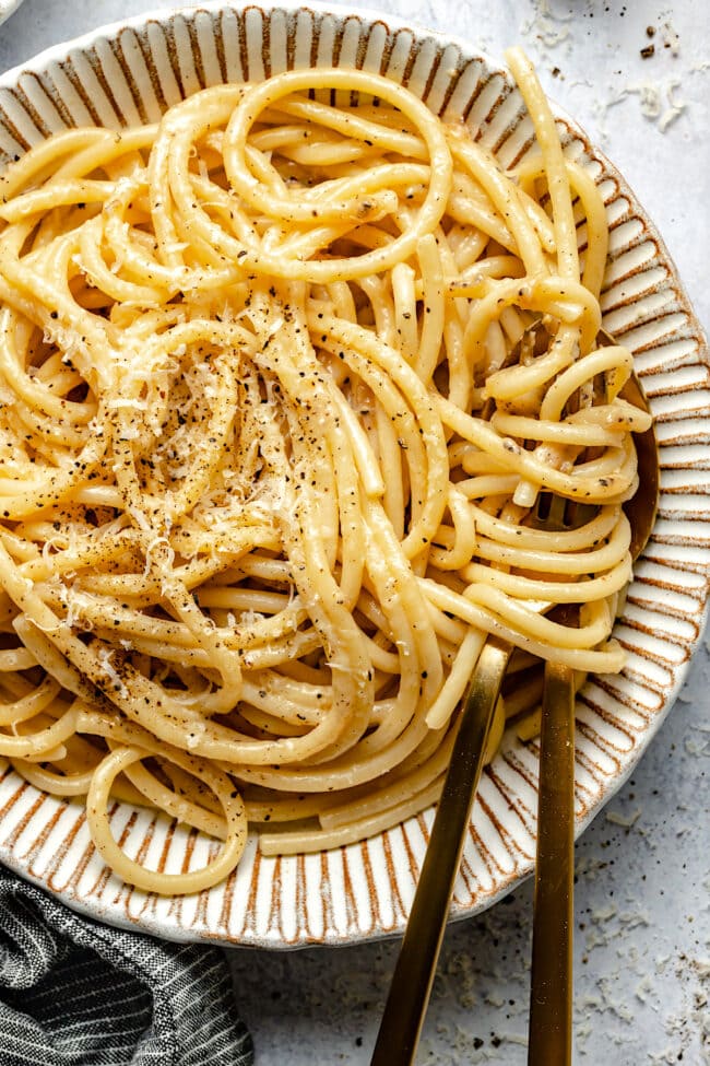 bucatini cacio e pepe pasta in bowl 