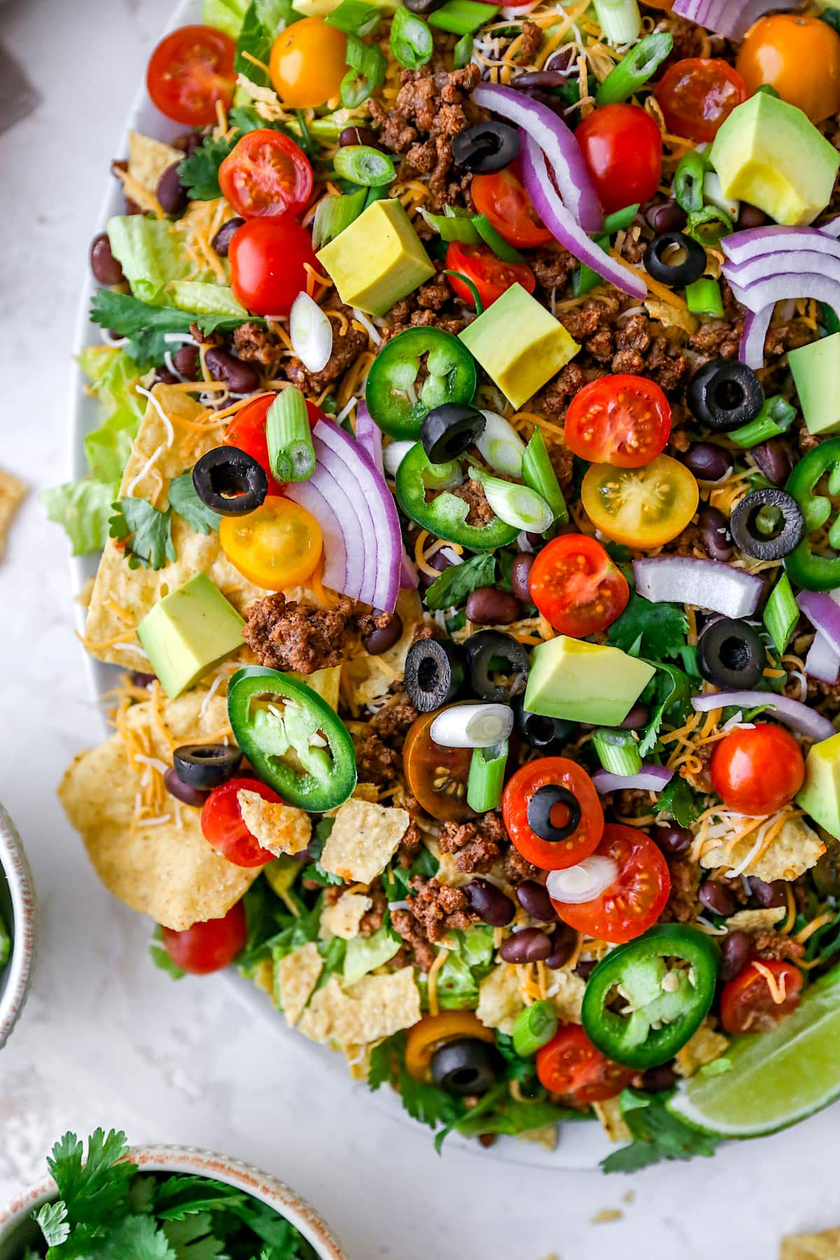 taco salad with chips and toppings.