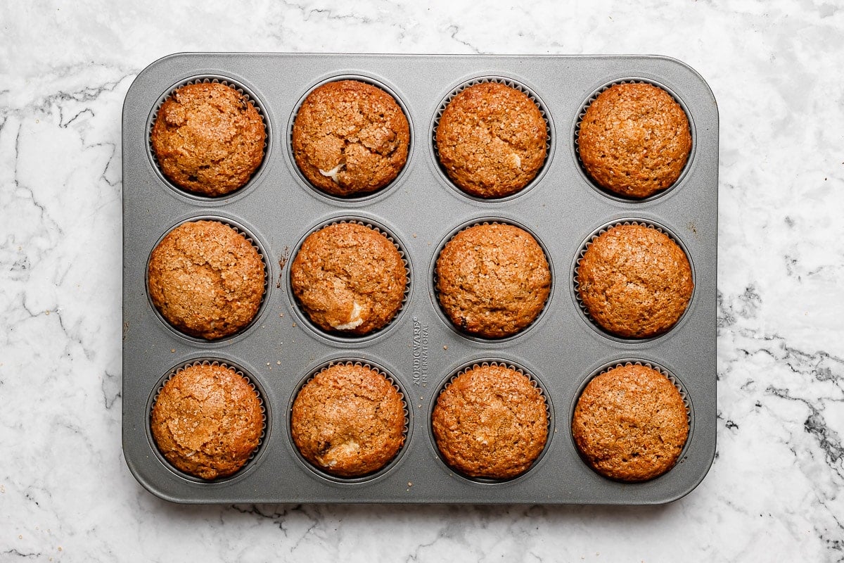 carrot cake muffins in pan. 