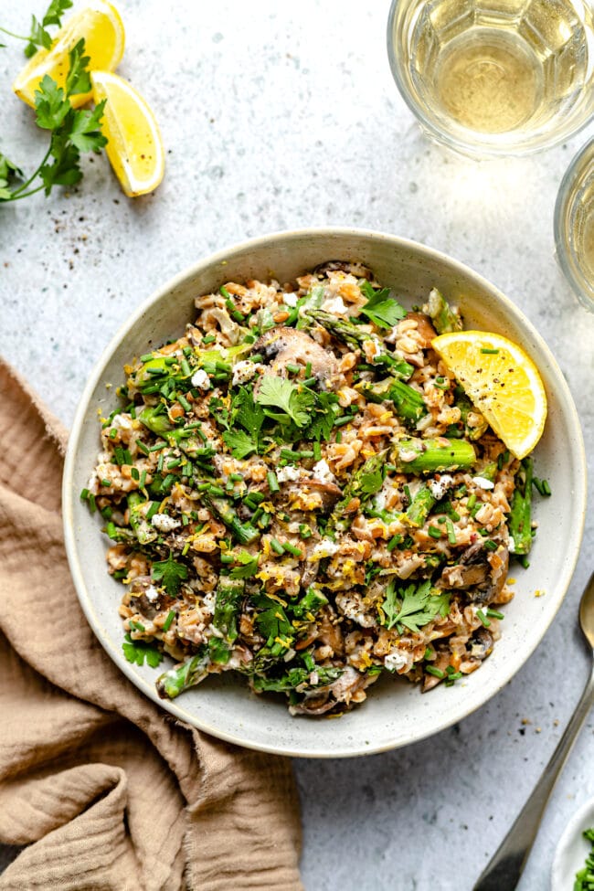 farro with mushrooms and asparagus in bowl