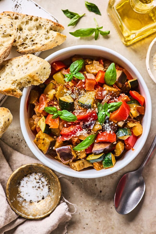 ratatouille in bowl with bread.