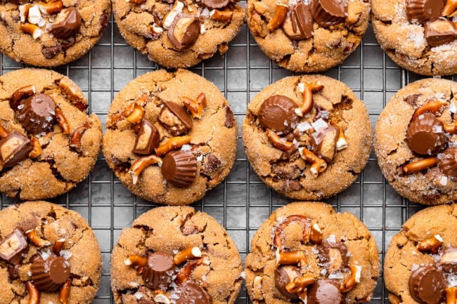 salted pretzel peanut butter cup cookies on cooling rack