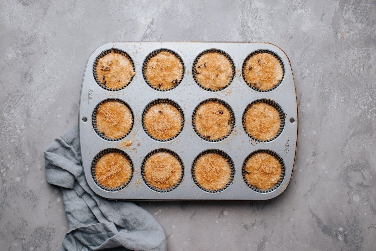 healthy banana muffin batter in muffin tin. 