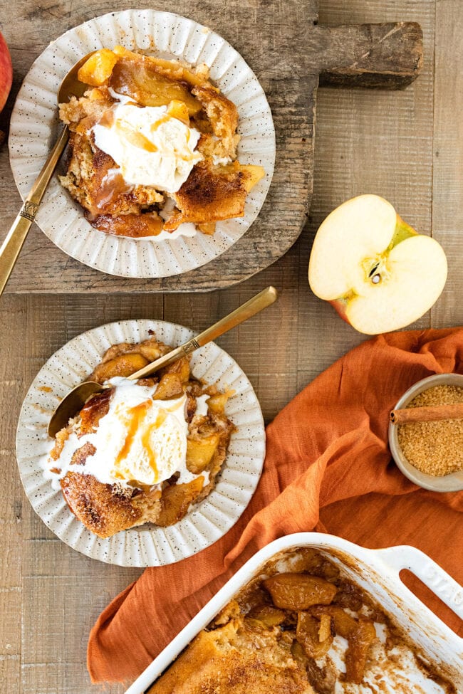 Apple Cobbler in bowls with ice cream.