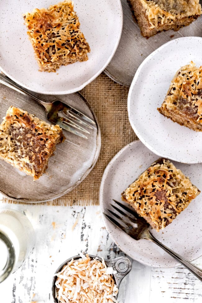 pieces of oatmeal cake on plates with forks