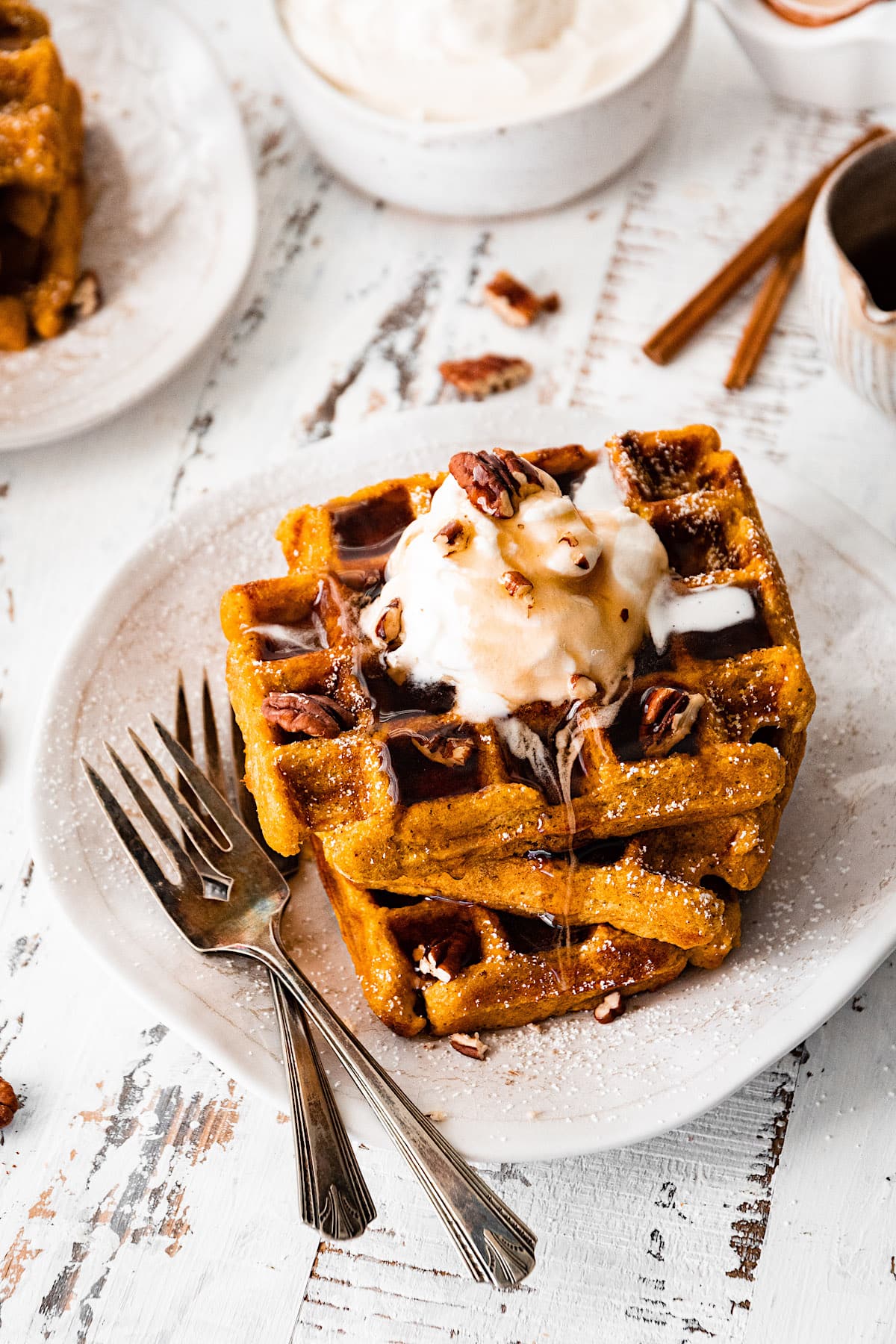 https://www.twopeasandtheirpod.com/wp-content/uploads/2021/10/Pumpkin-Waffles-8.jpg