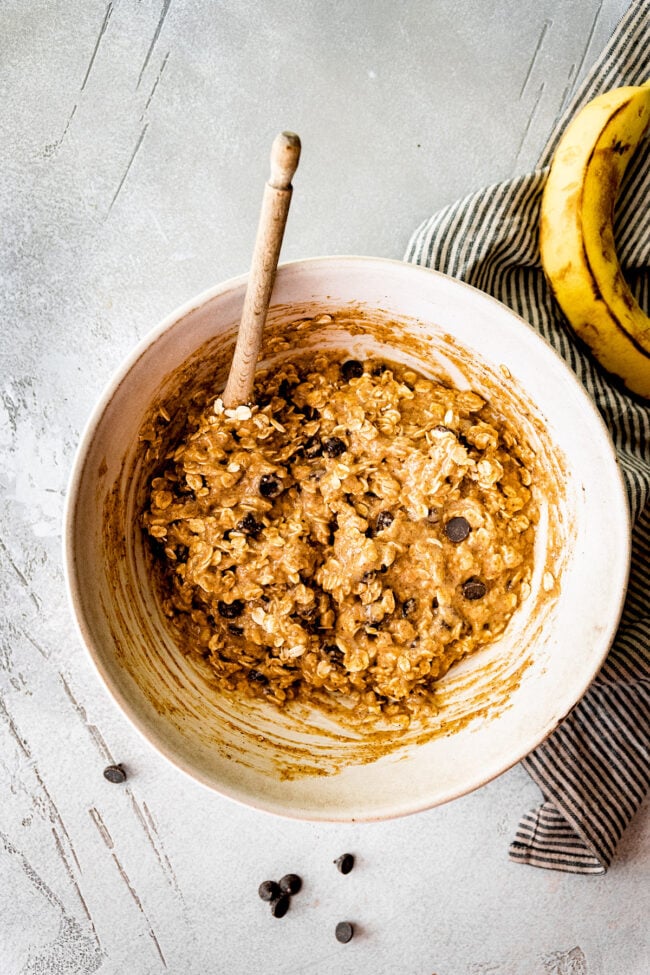 breakfast cookie cookie dough in a bowl with a wooden spoon