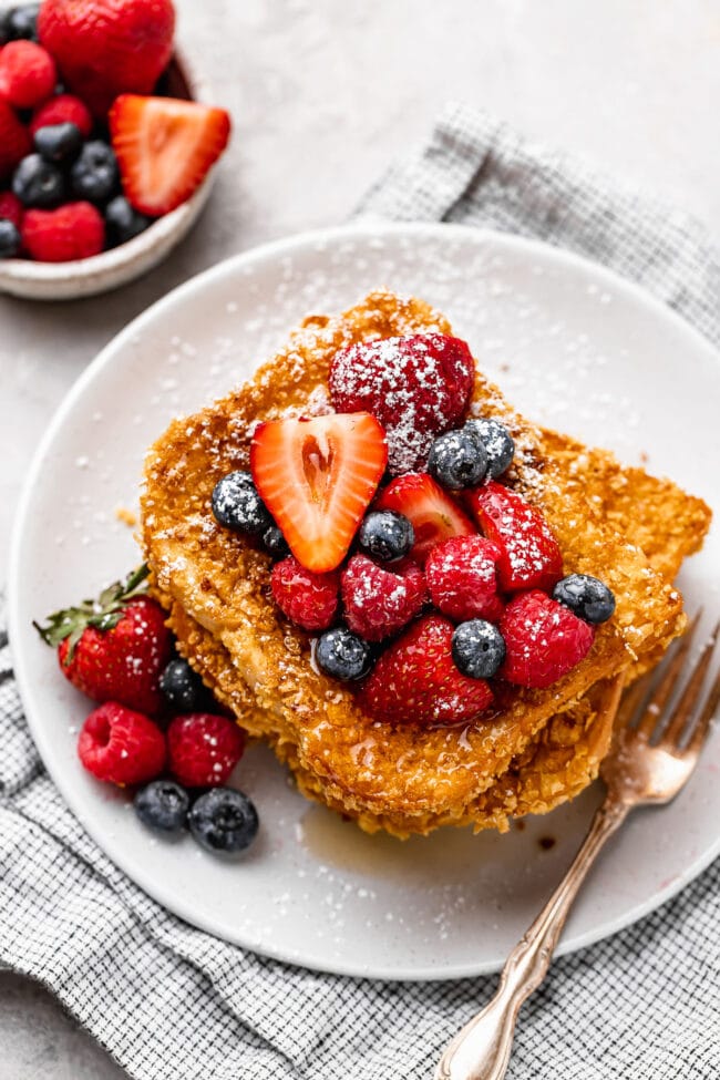 crunchy French toast on plate with berries