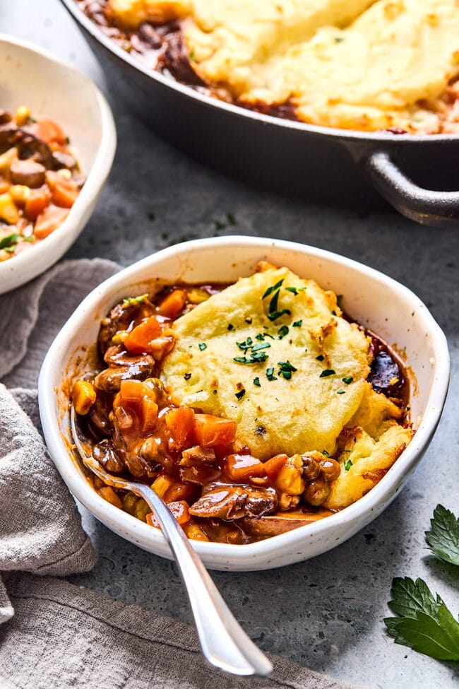 vegetarian shepherd's pie in bowl with spoon