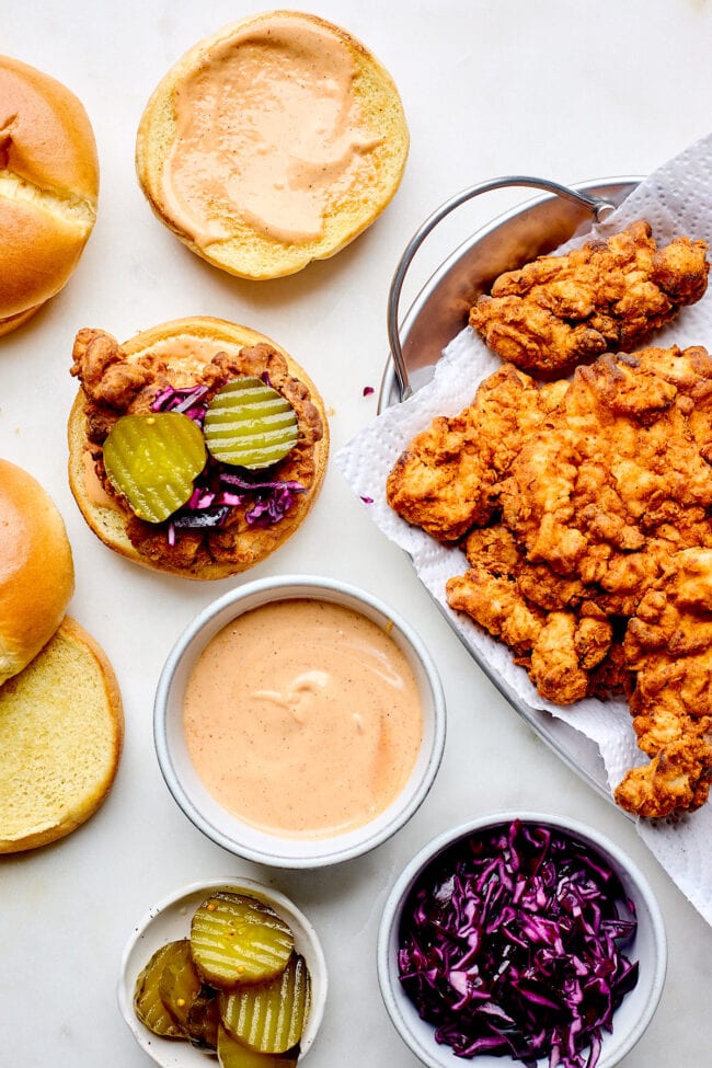 assembling fried chicken sandwiches