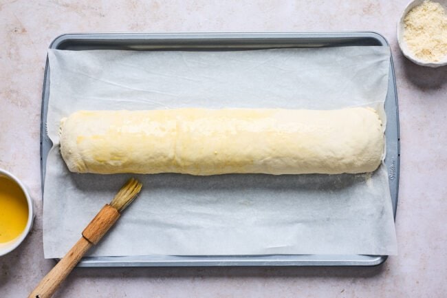unbaked Stromboli on a baking sheet