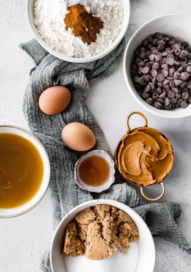 brown butter Biscoff chocolate chip cookie ingredients on towel.