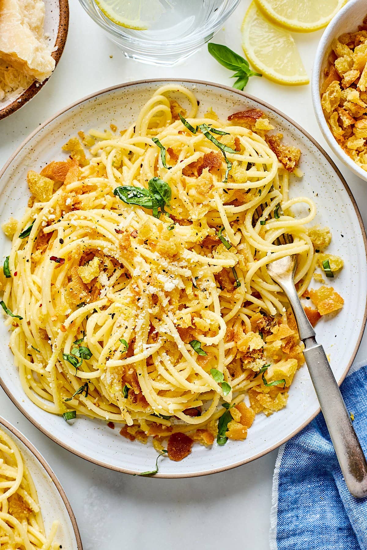 lemon spaghetti on plate with fork. 