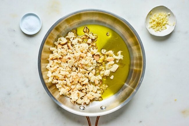 garlic breadcrumbs in pan with oil