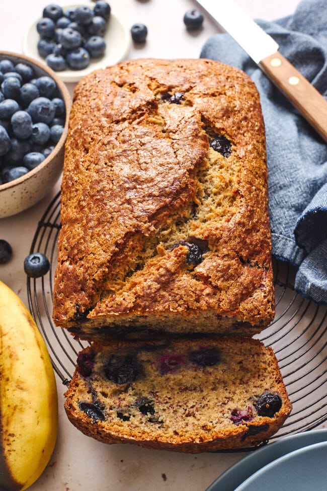 blueberry banana bread on cooling rack.