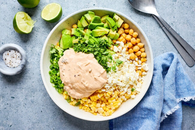 chipotle chickpea corn salad ingredients in bowl. 
