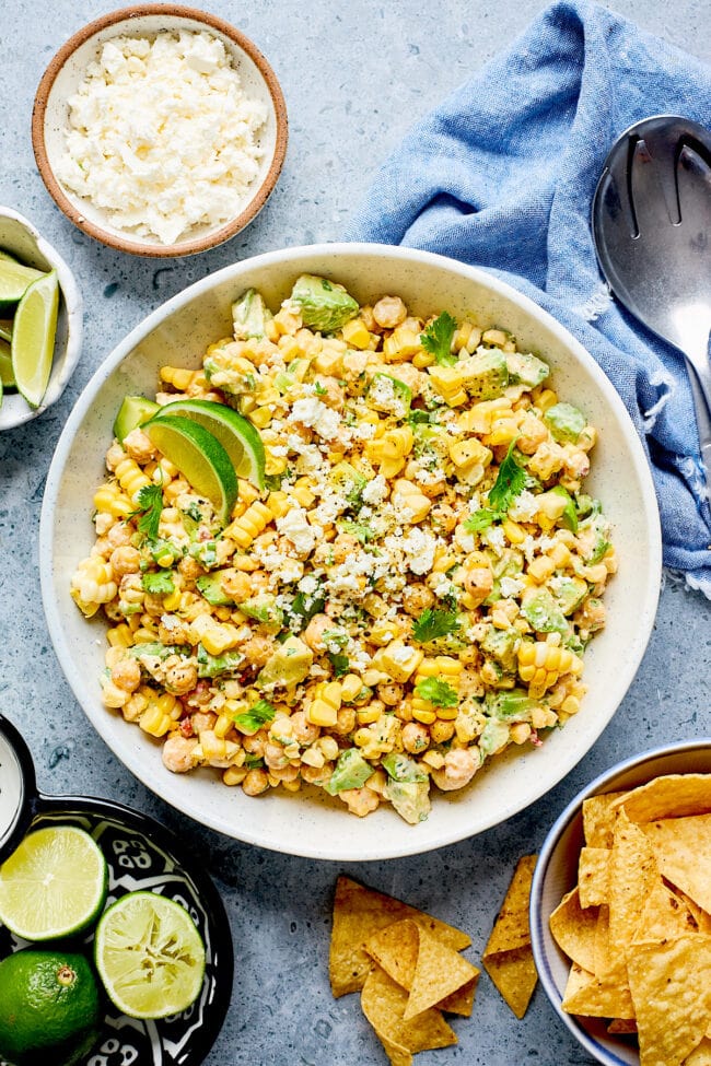 chipotle chickpea corn salad in bowl with cotija cheese. 