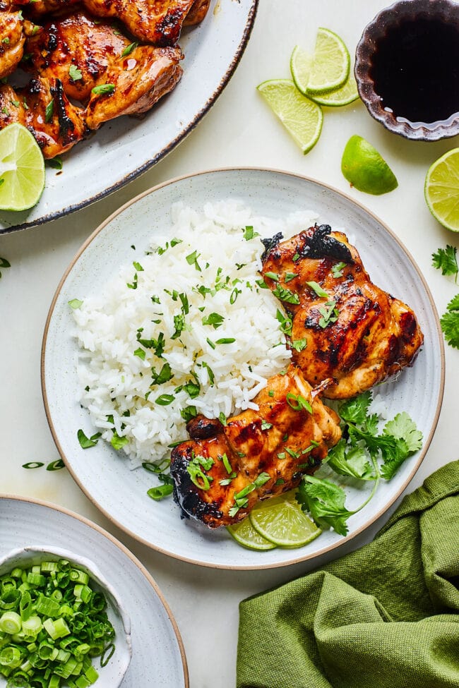 ginger chicken with rice on plate.