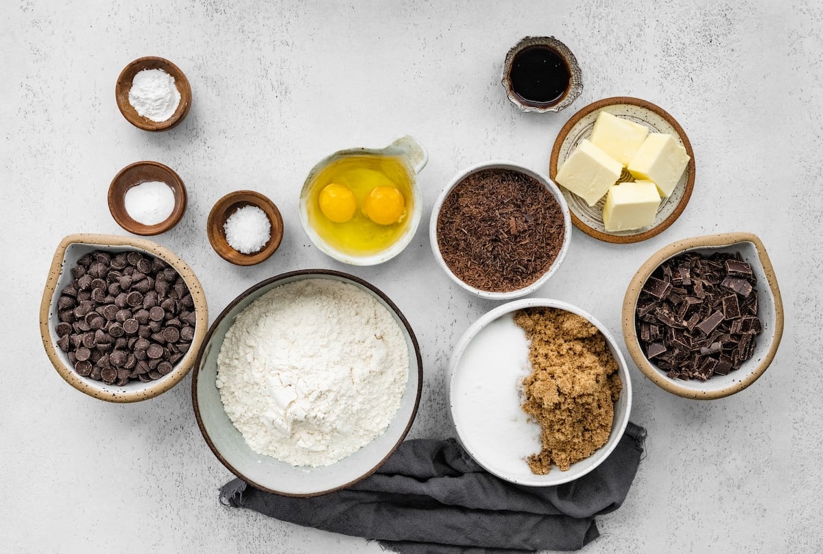 chocolate chip cookie ingredients in bowls. 