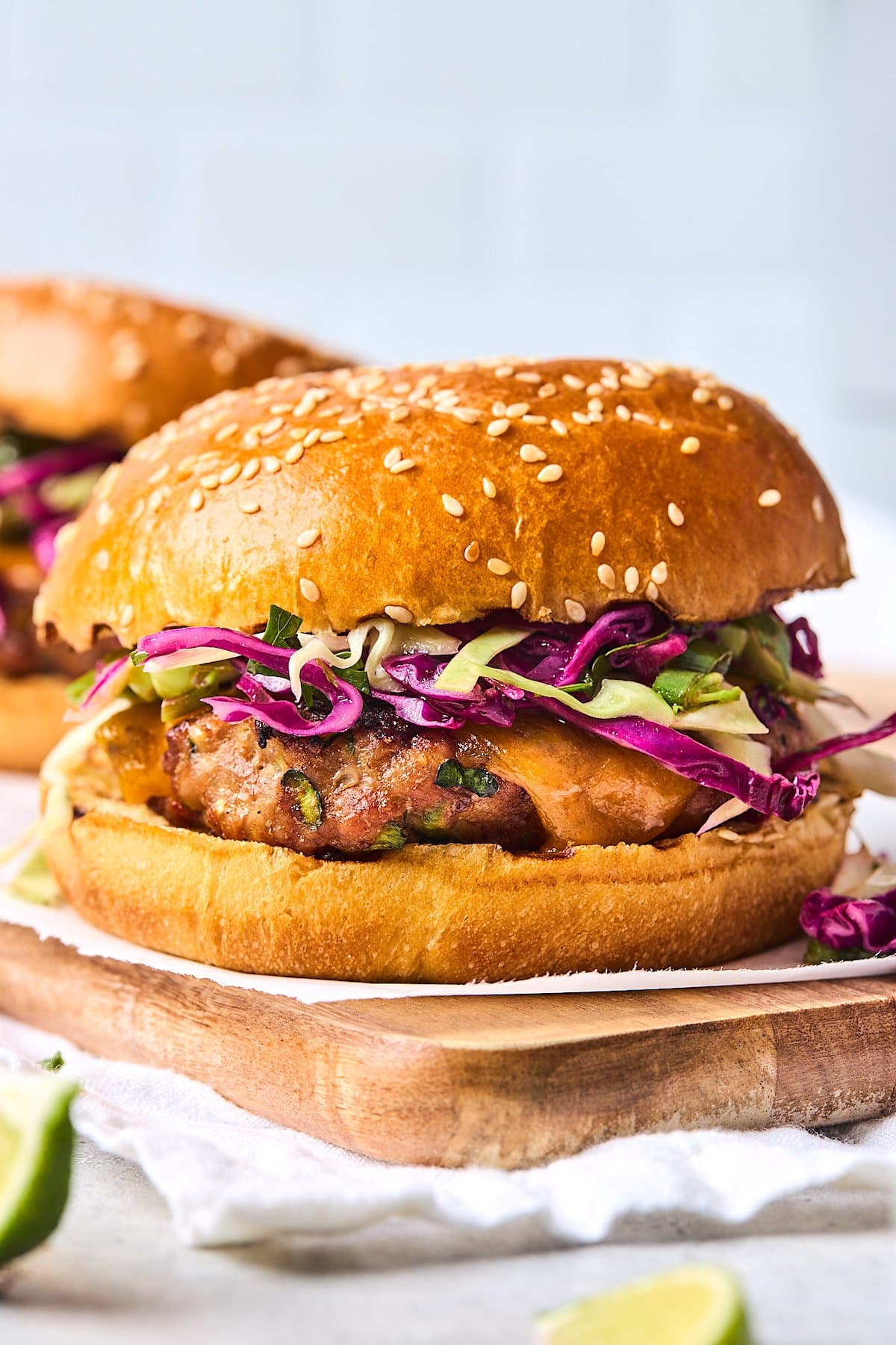 turkey burger with slaw on a bun.