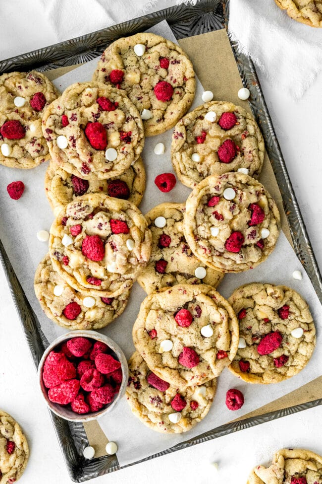 white chocolate raspberry cookies on baking sheet. 