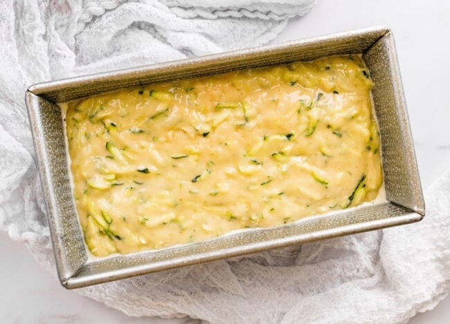 unbaked lime zucchini loaf in pan. 