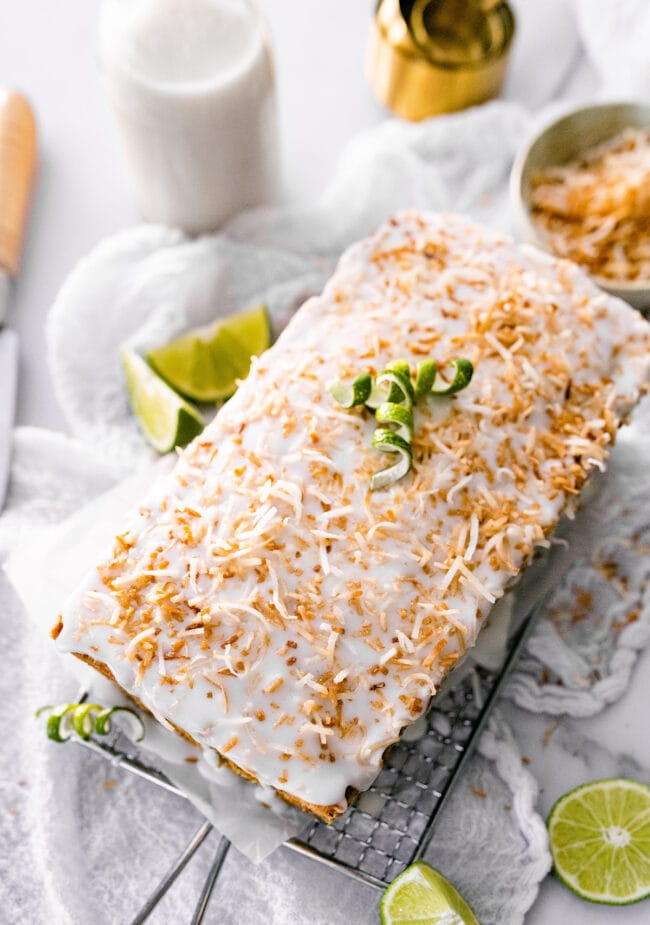 lime zucchini loaf cake with a slice missing.