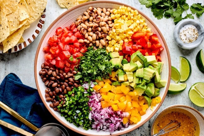 cowboy caviar ingredients in large bowl.