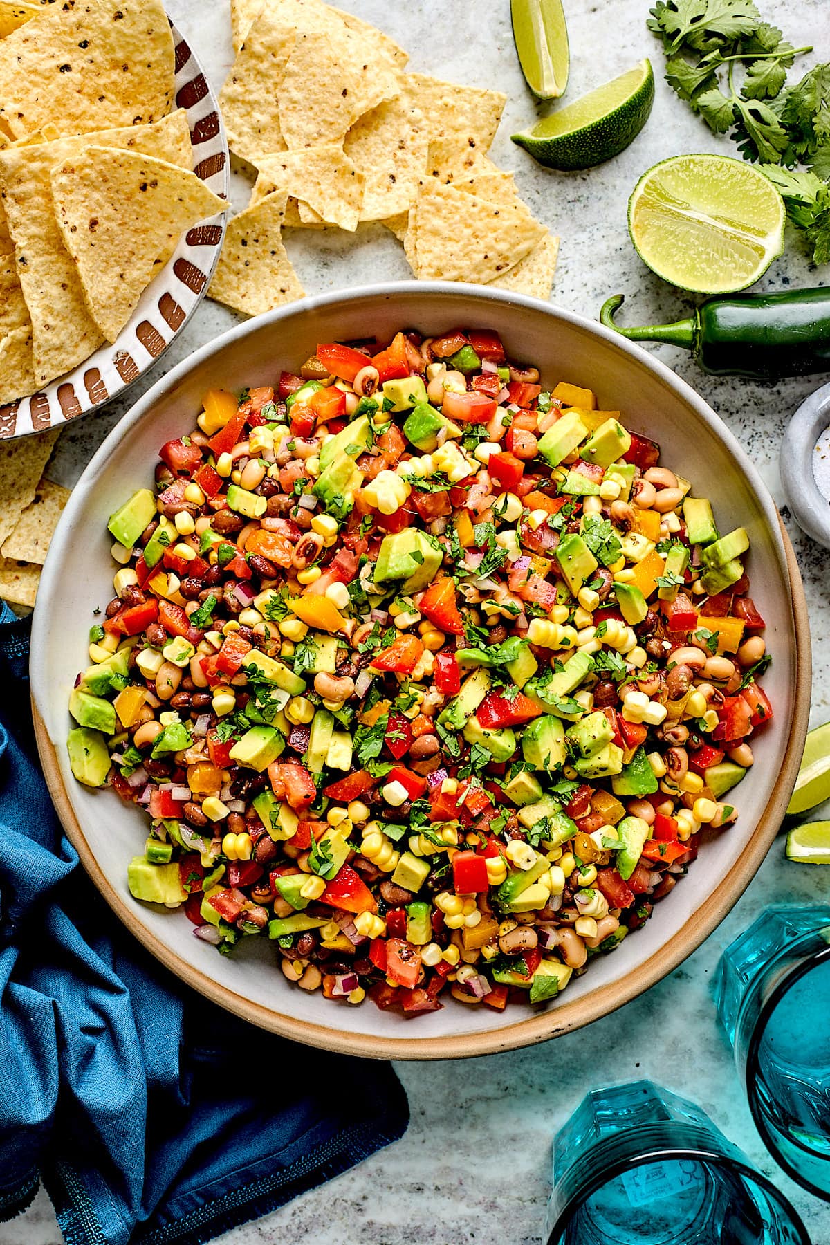 cowboy caviar in big bowl with tortilla chips.