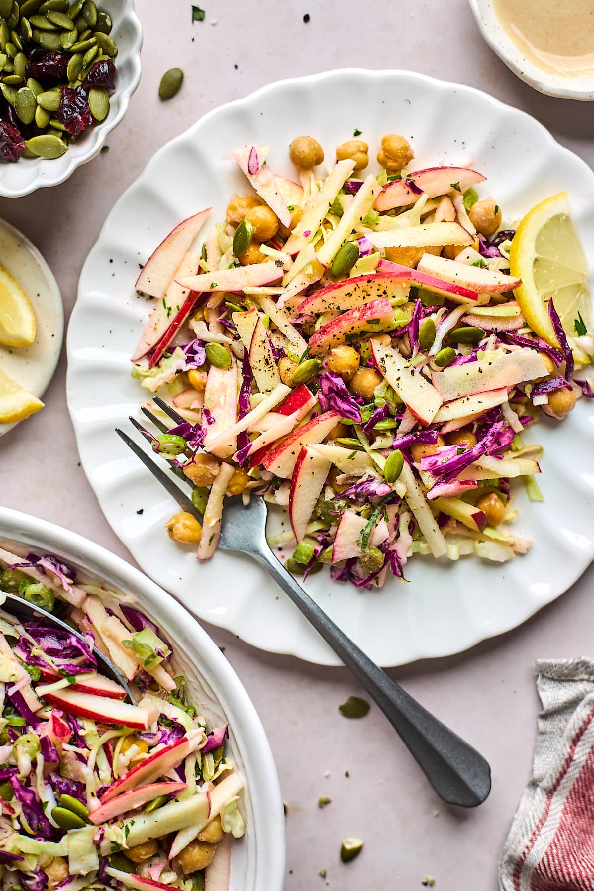 apple slaw on plate with fork. 