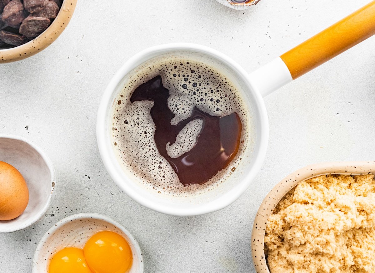 browned butter in small skillet with cookie ingredients in bowls. 