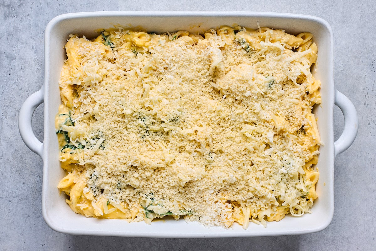 butternut squash baked ziti in white baking dish with panko breadcrumb topping before going in oven. 
