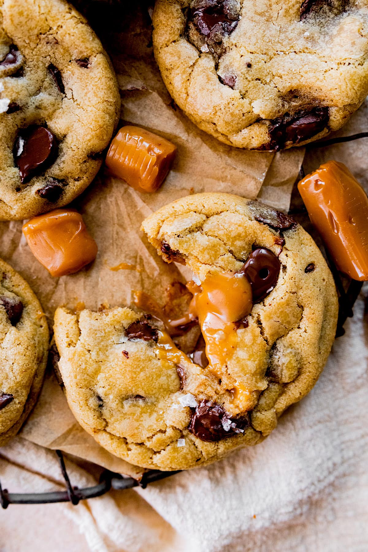 salted caramel chocolate chip cookies with gooey caramel center.