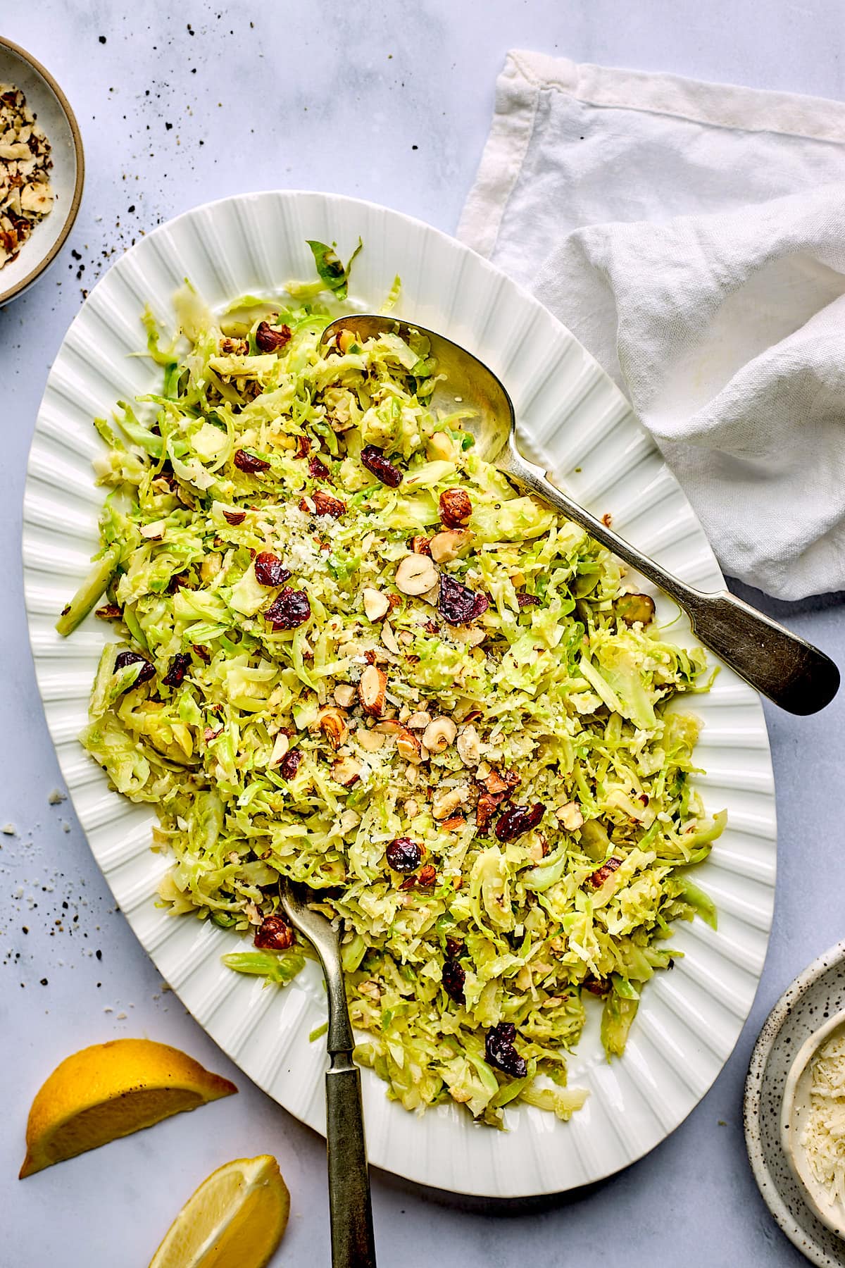 Sauted Shredded Brussels Sprouts with Parmesan and Hazelnuts - Two Peas & Their Pod