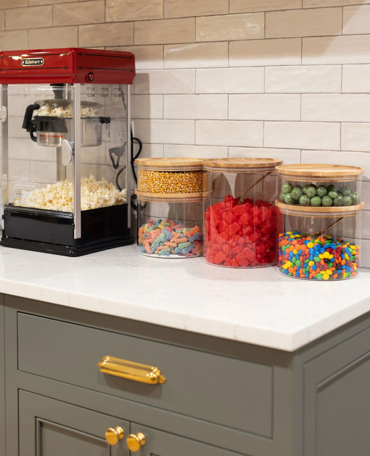 basement theater snack area with popcorn make rand candy jars. 