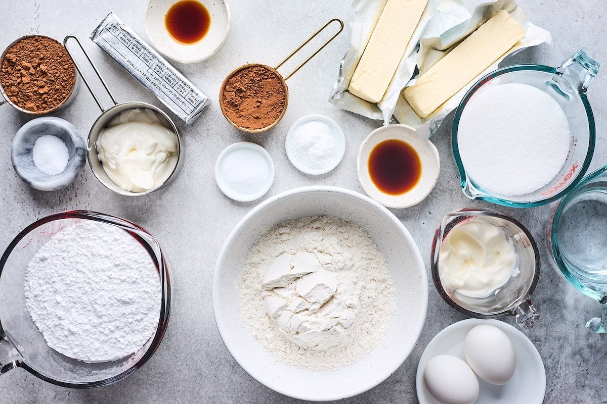 chocolate cake ingredients in bowls. 