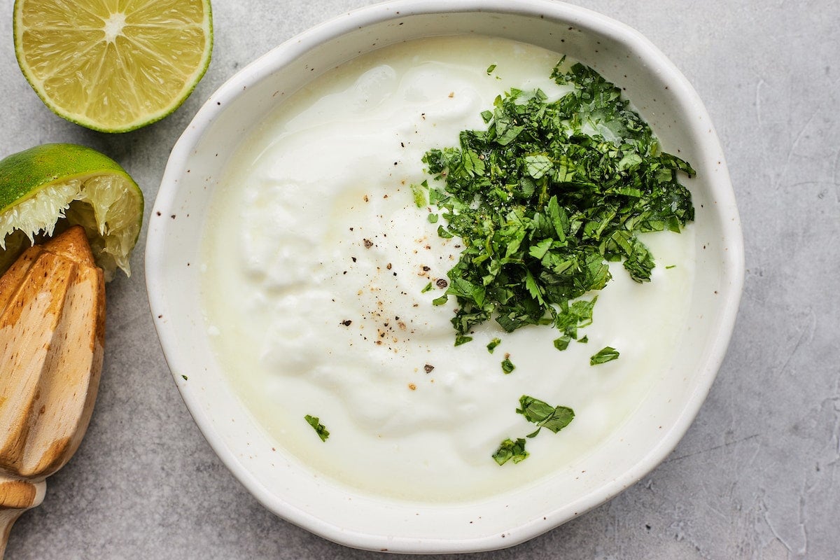 lime crema for fish tacos in bowl. 