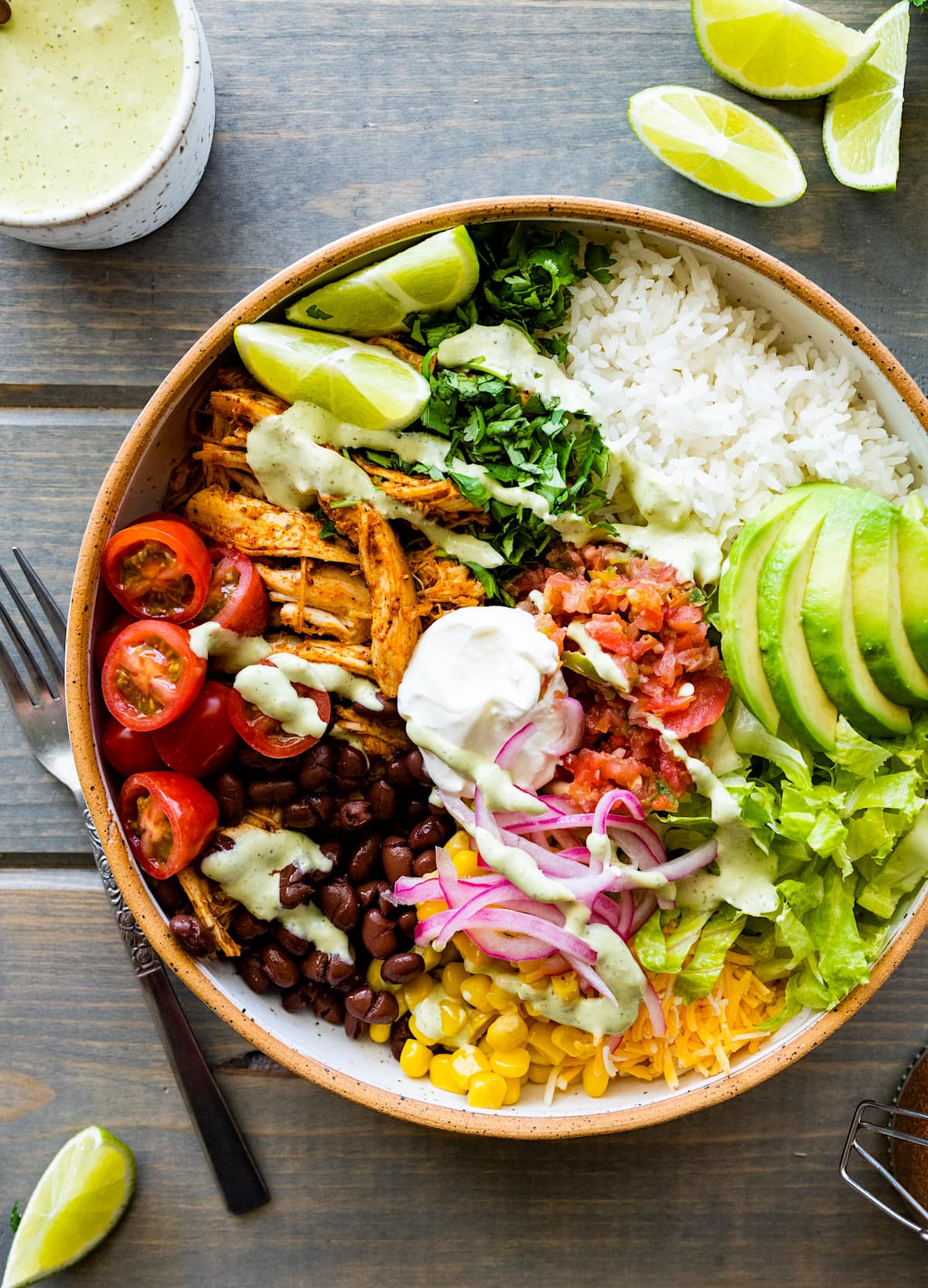 chicken burrito bowl with creamy cilantro lime dressing. 