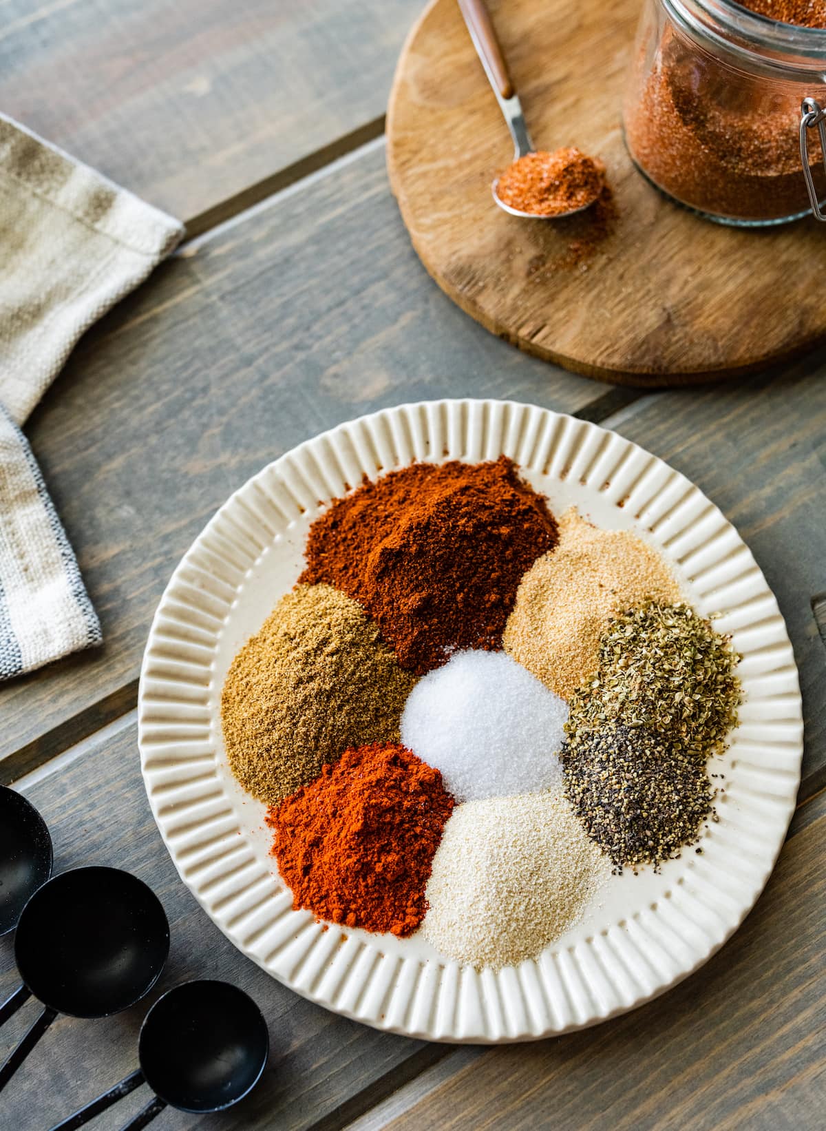 spices to make taco seasoning on a plate. 