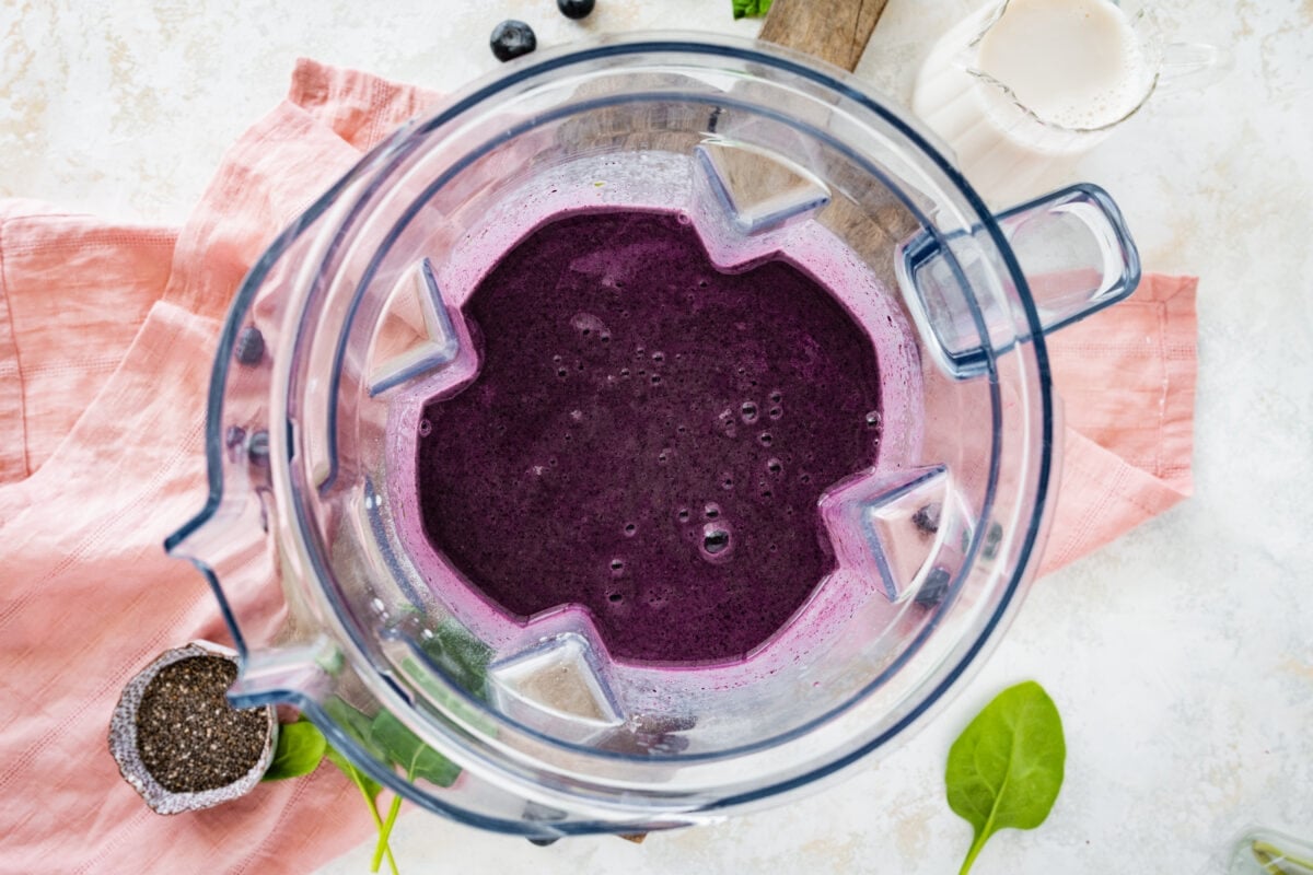 blueberry smoothie in blender. 