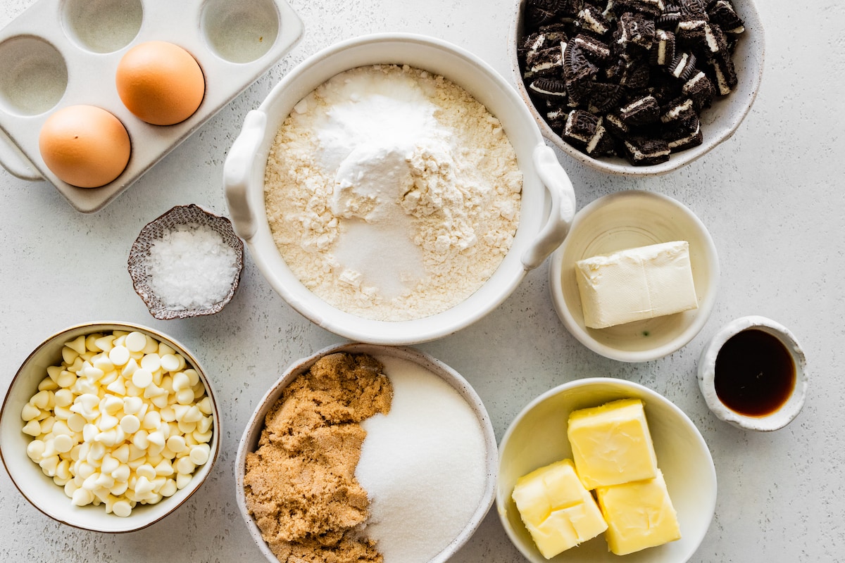 ingredients in bowls to make cookies and cream cookies. 